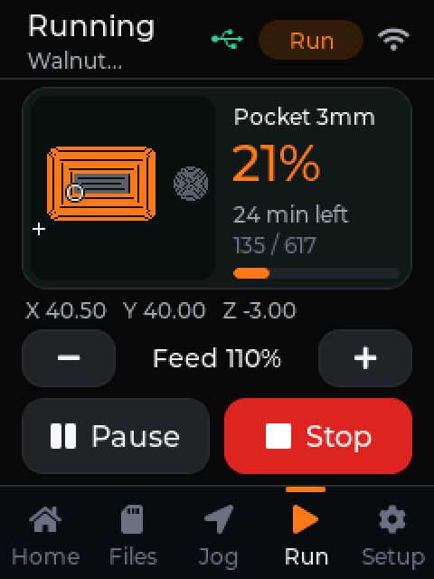 The WebCAM controller's 2.8 inch screen running a pocket job at 21 percent, with time left, position, feed override, and Pause and Stop buttons